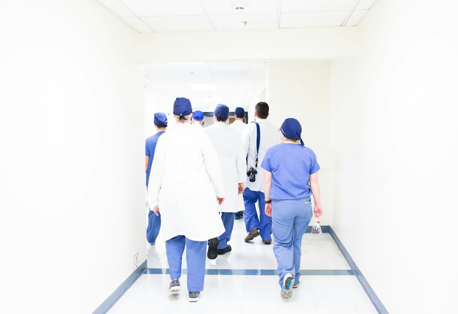 A clinical team walking through a hospital corridor